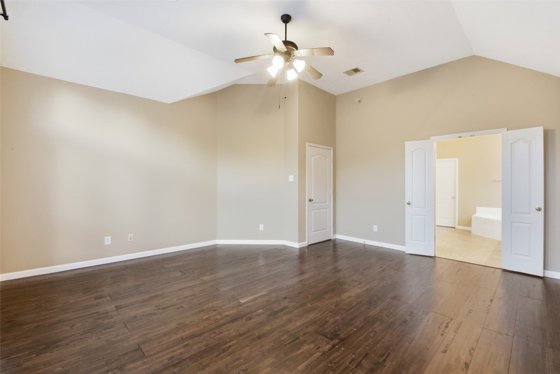 24938 Crystal Stone Lane Katy, TX 77494 - Photo 29 of 50 a view of an empty room with wooden floor