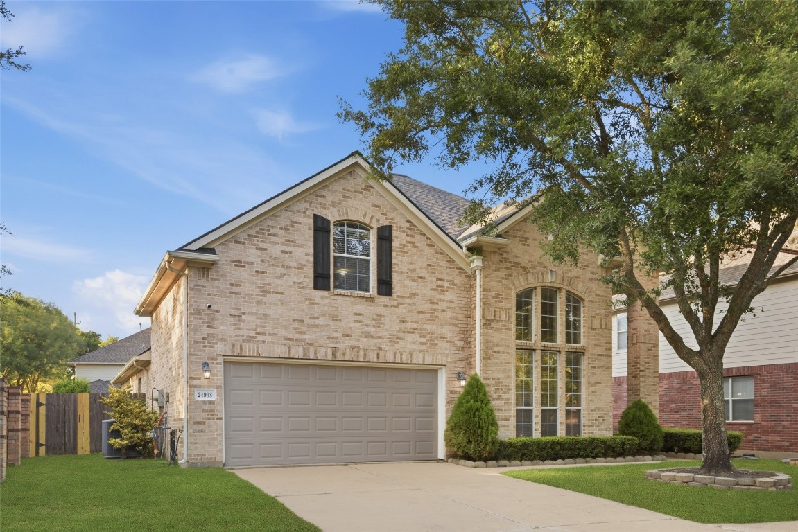 24938 Crystal Stone Lane Katy, TX 77494 - Photo 3 of 50 a view of a house with a yard
