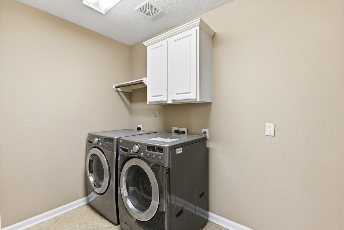 24938 Crystal Stone Lane Katy, TX 77494 - Photo 34 of 50 a utility room with dryer and washer