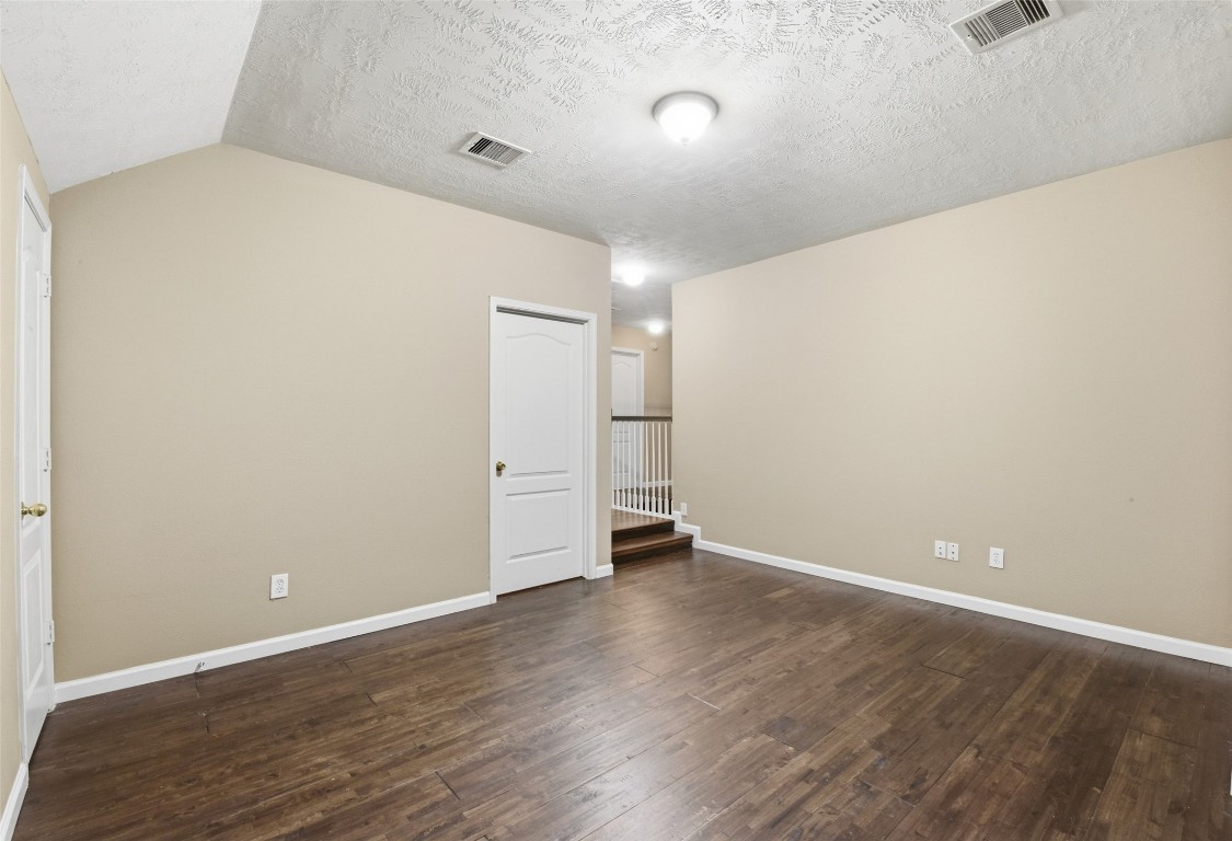 24938 Crystal Stone Lane Katy, TX 77494 - Photo 40 of 50 wooden floor in an empty room