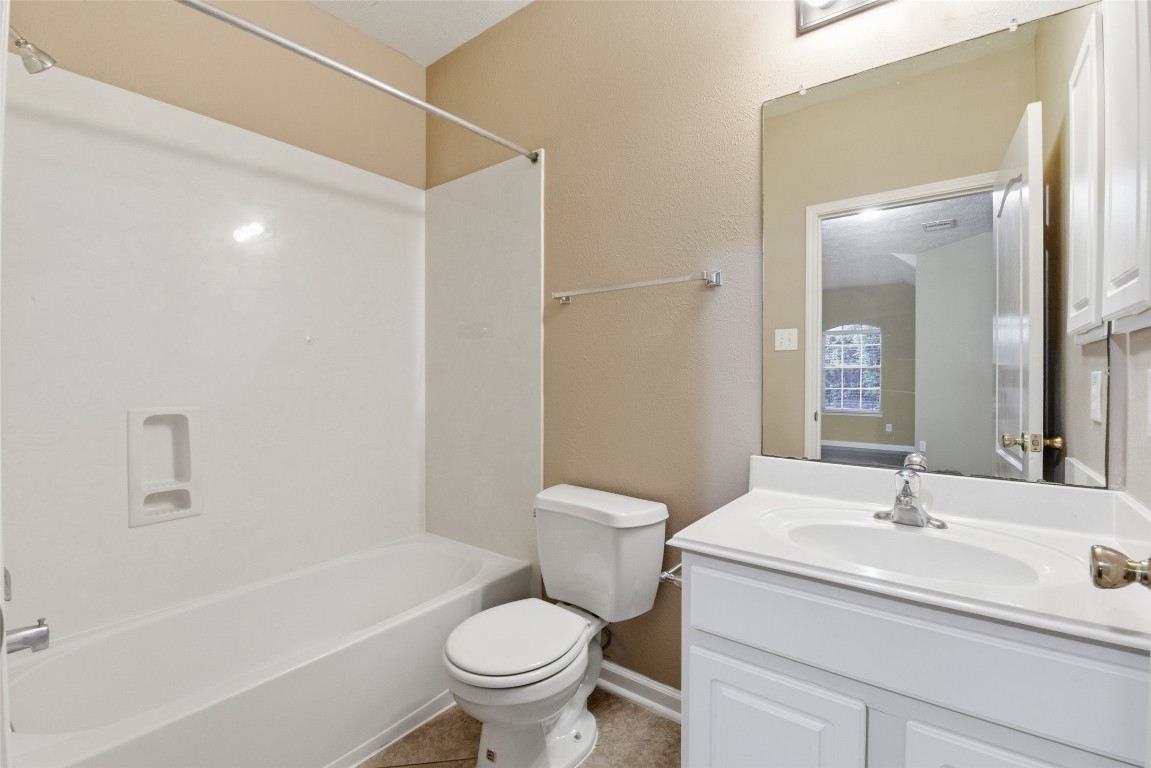 24938 Crystal Stone Lane Katy, TX 77494 - Photo 42 of 50 a bathroom with a sink toilet and shower