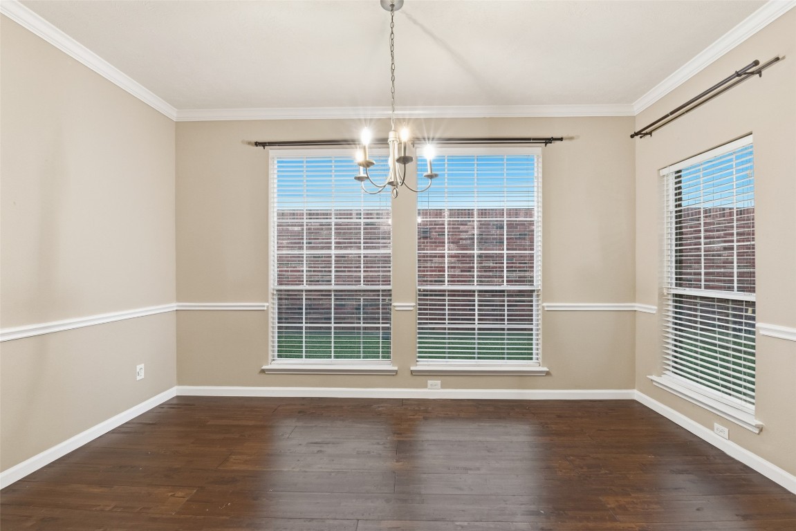 24938 Crystal Stone Lane Katy, TX 77494 - Photo 10 of 50 a view of a livingroom with wooden floor and a window