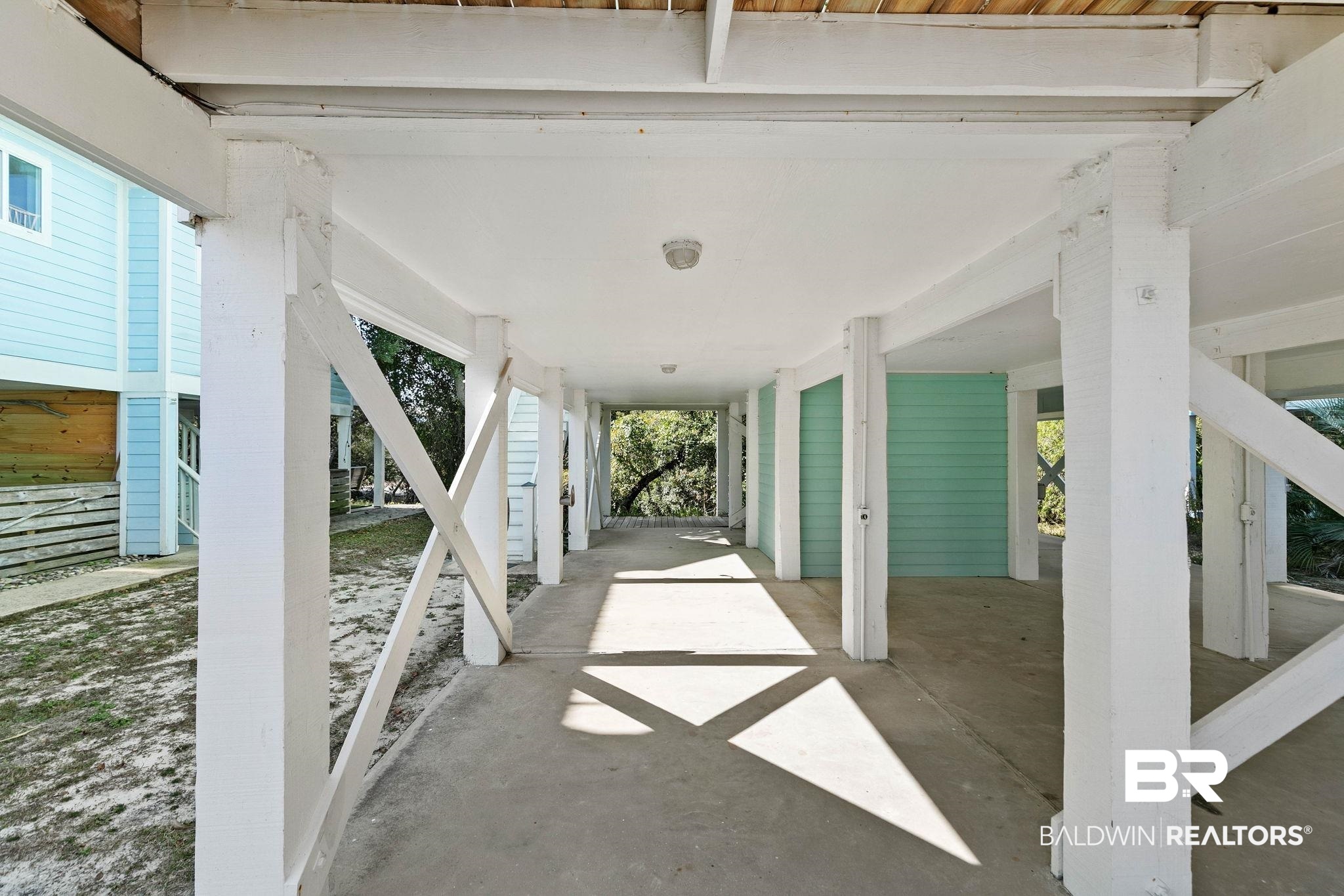 545 Plantation Road, Unit 3 Gulf Shores, AL 36542 - Photo 42 of 54 View of patio featuring stairway