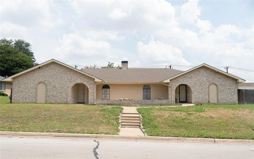 8300 El Retiro Road Fort Worth, TX 76116 - Photo 1 of 1 a front view of a house with a garden and yard