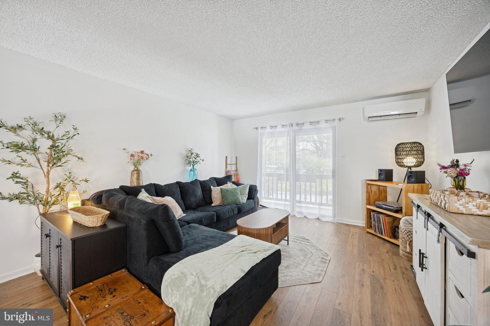 440 South State Street, Unit D7 Newtown, PA 18940 - Photo 2 of 14 spacious living room with lots of natural light