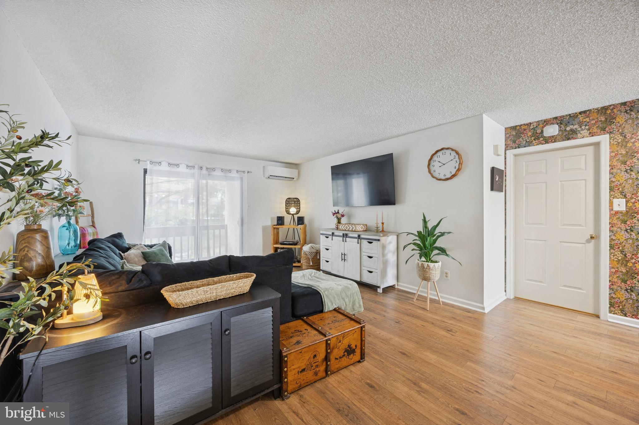 440 South State Street, Unit D7 Newtown, PA 18940 - Photo 3 of 14 living room has sliders to a private patio