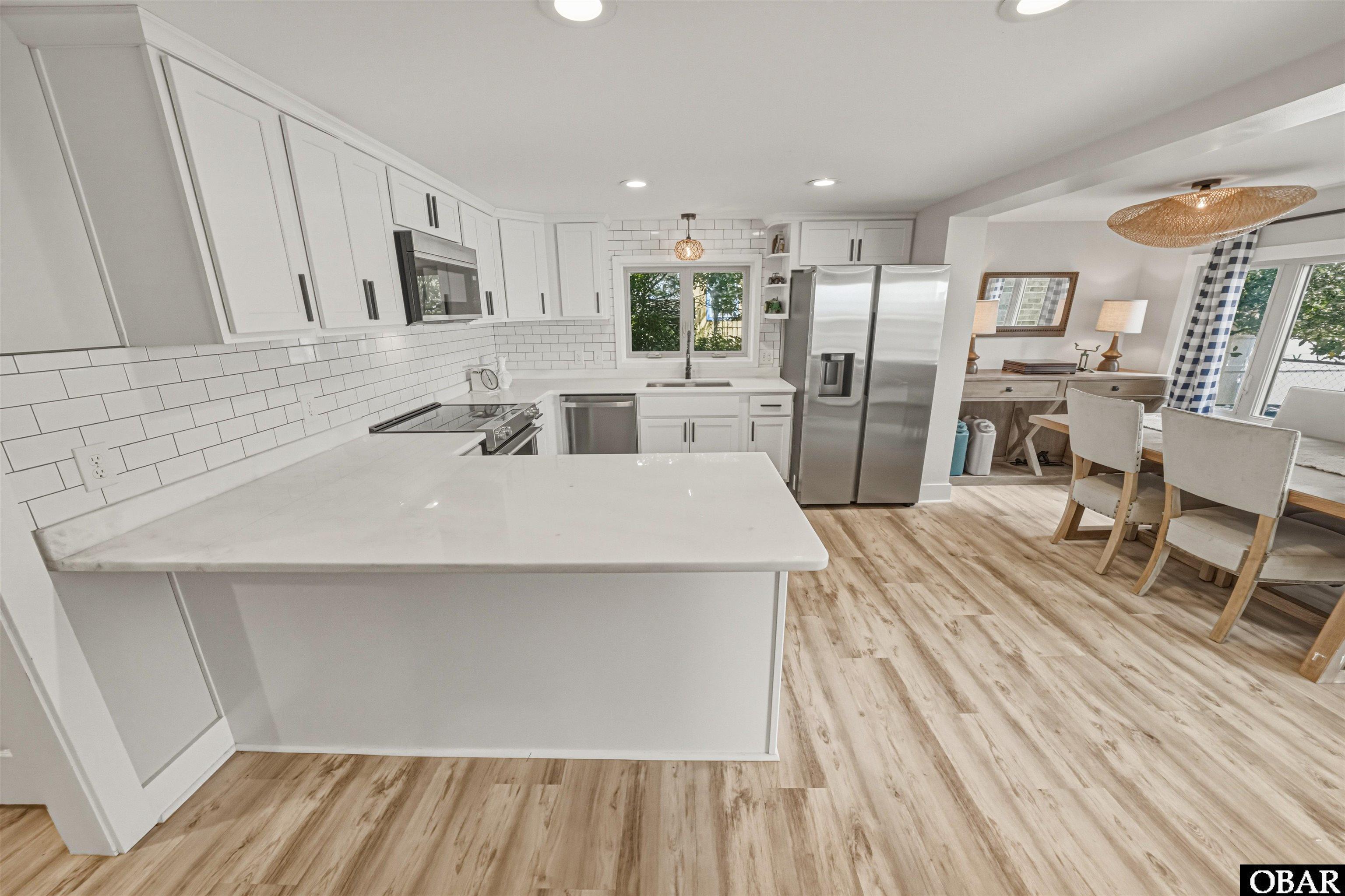 932 Waterlily Road Coinjock, NC 27923 - Photo 20 of 86 Bar Seating