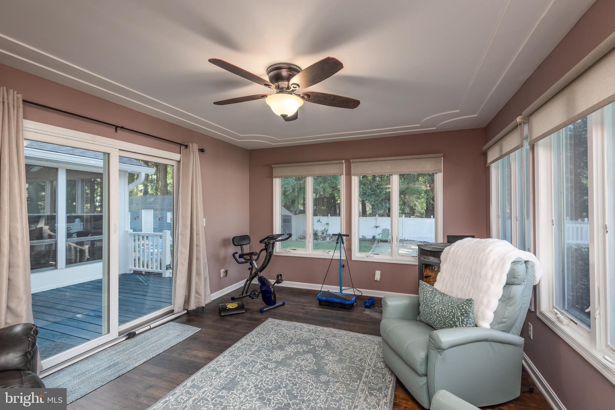 105 Barren Ridge Road Chester, MD 21619 - Photo 14 of 46 Family room w/lots of light, pellet stove