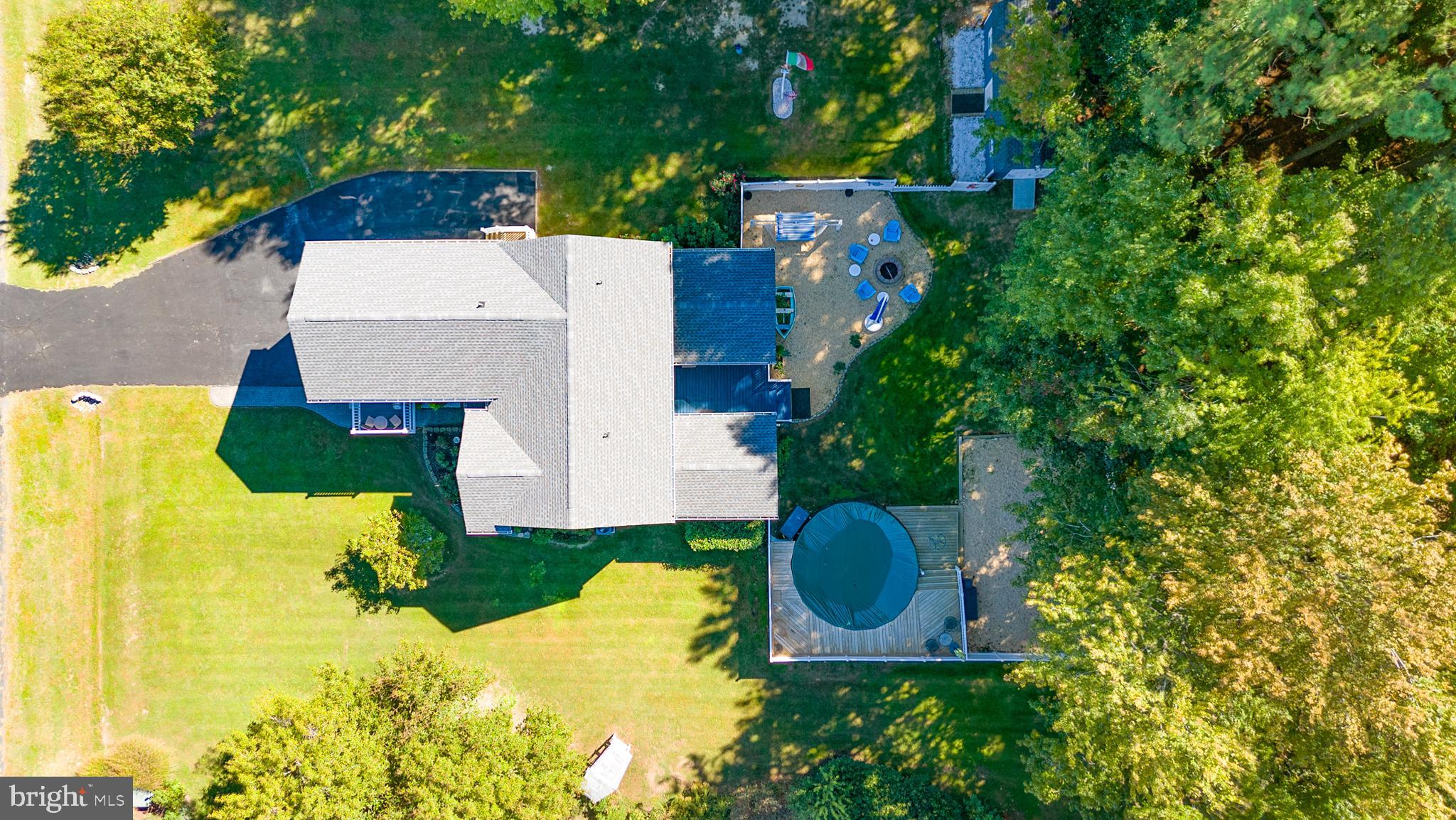 105 Barren Ridge Road Chester, MD 21619 - Photo 5 of 46 Privacy fence, pool, fire pit area, playground