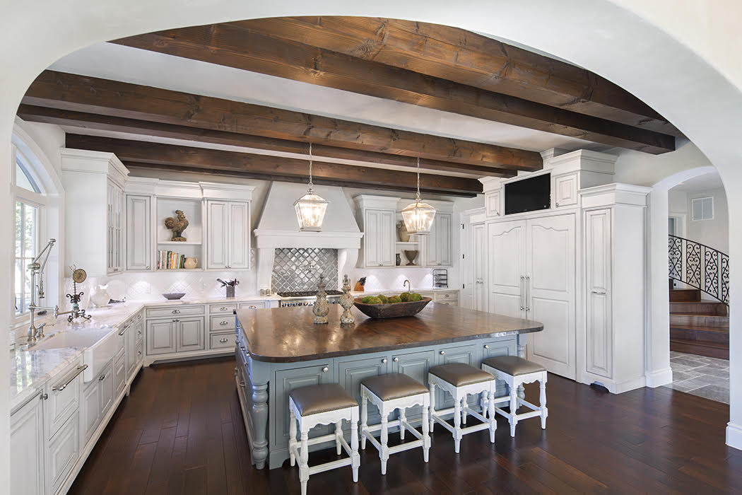 14610 Agarita Road Austin, TX 78734 - Photo 32 of 34 a dining hall with granite countertop a stove and white cabinets