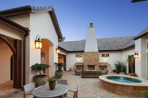 a view of yard with patio