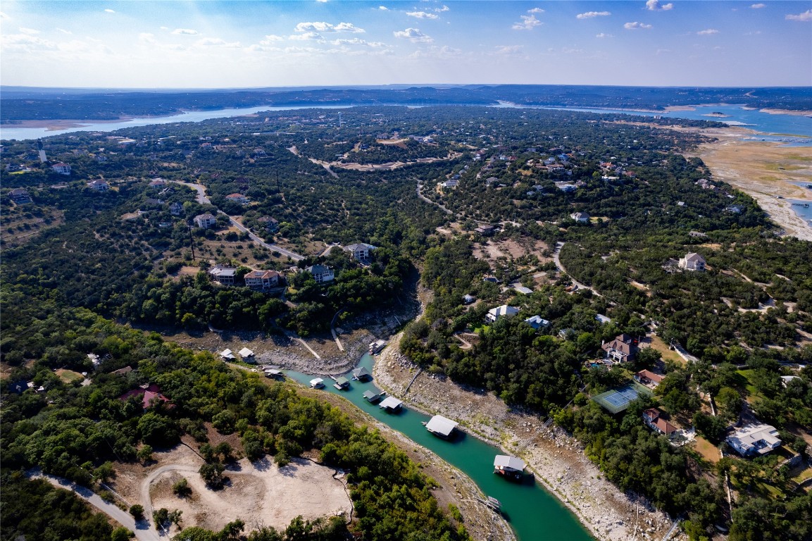 14610 Agarita Road Austin, TX 78734 - Photo 7 of 34 an aerial view of residential houses with outdoor space and trees