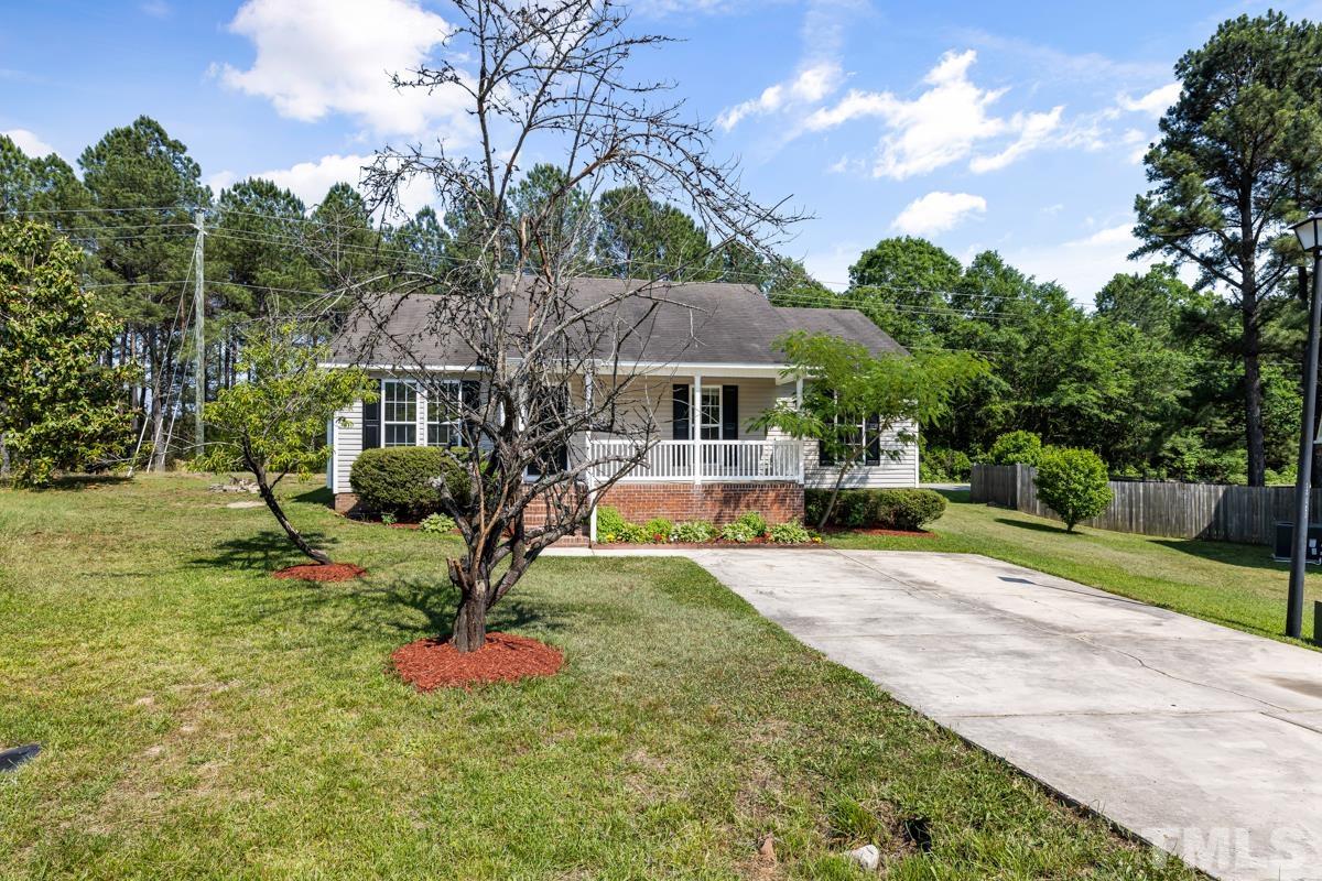 4516 Eider Court Raleigh, NC 27616 - Photo 3 of 28 a view of a house with swimming pool