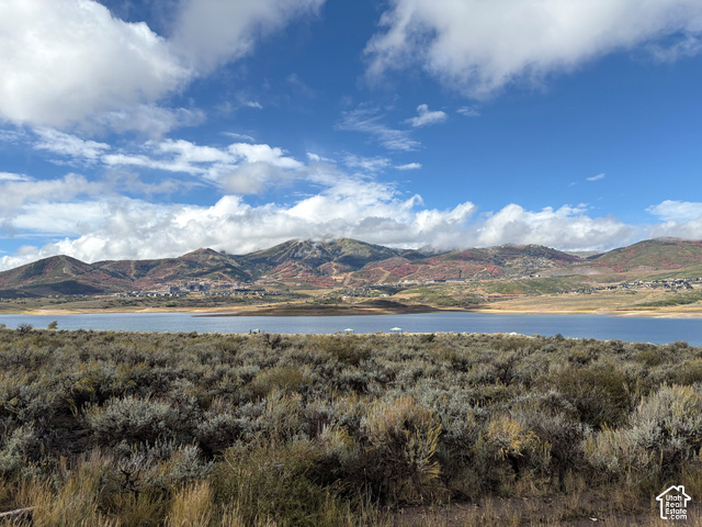 369 East Overlook Loop Kamas, UT 84036 - Photo 50 of 64 Expansive natural landscape with a large body of water, distant mountains, and a clear sky