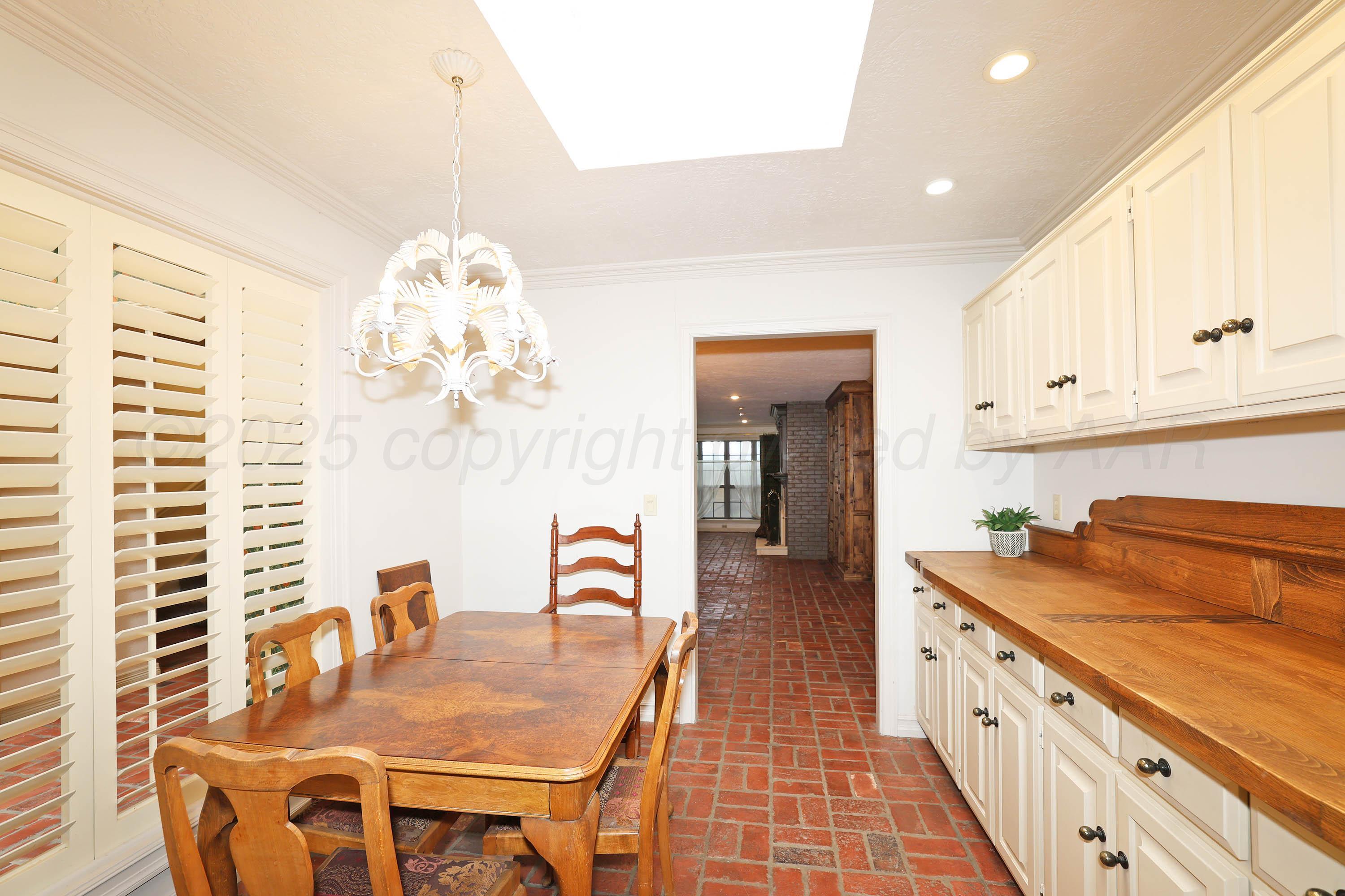 1615 South Bryan Street, Unit 19 Amarillo, TX 79102 - Photo 12 of 53 a kitchen with granite countertop lots of counter top space