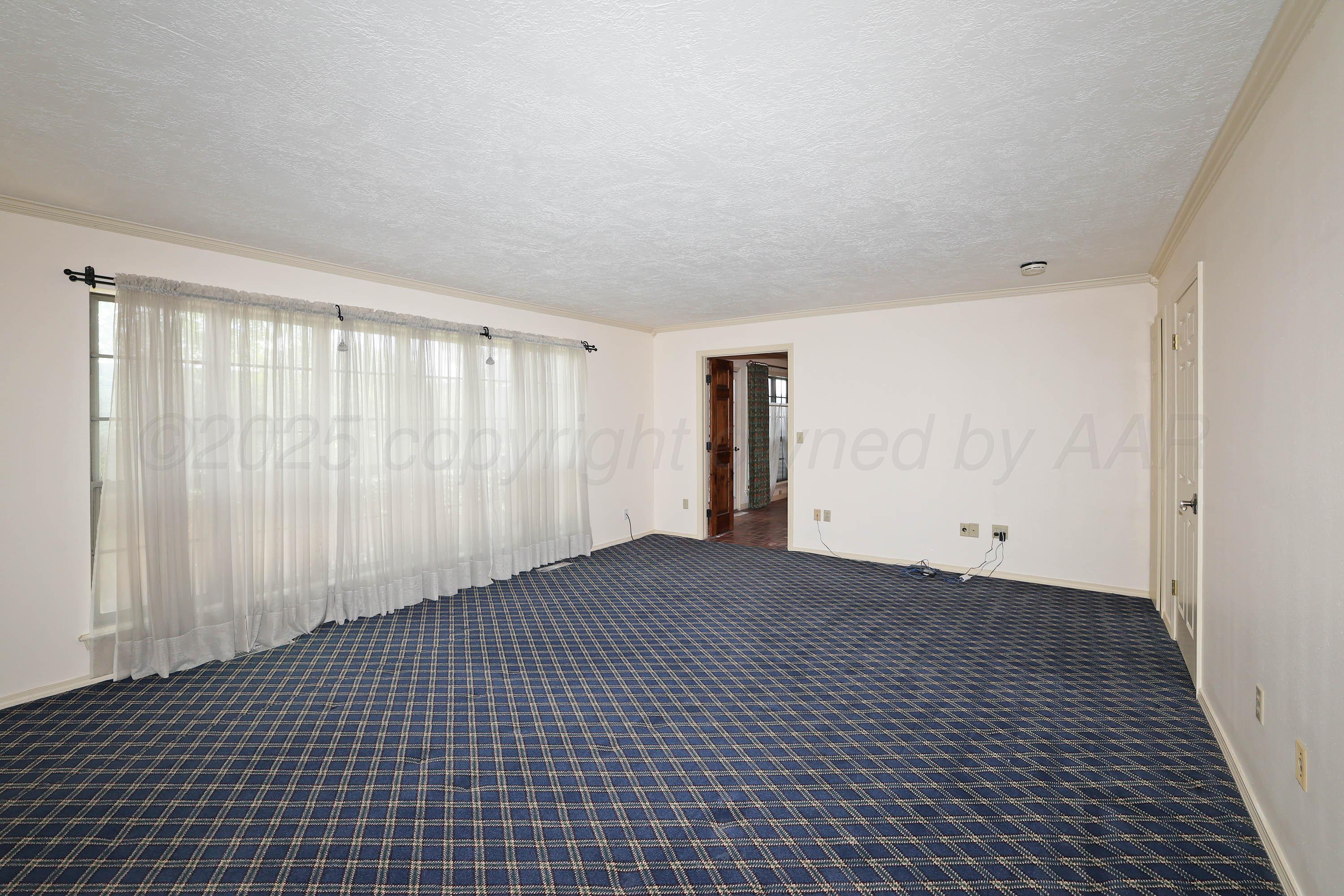1615 South Bryan Street, Unit 19 Amarillo, TX 79102 - Photo 20 of 53 a view of an empty room with a window