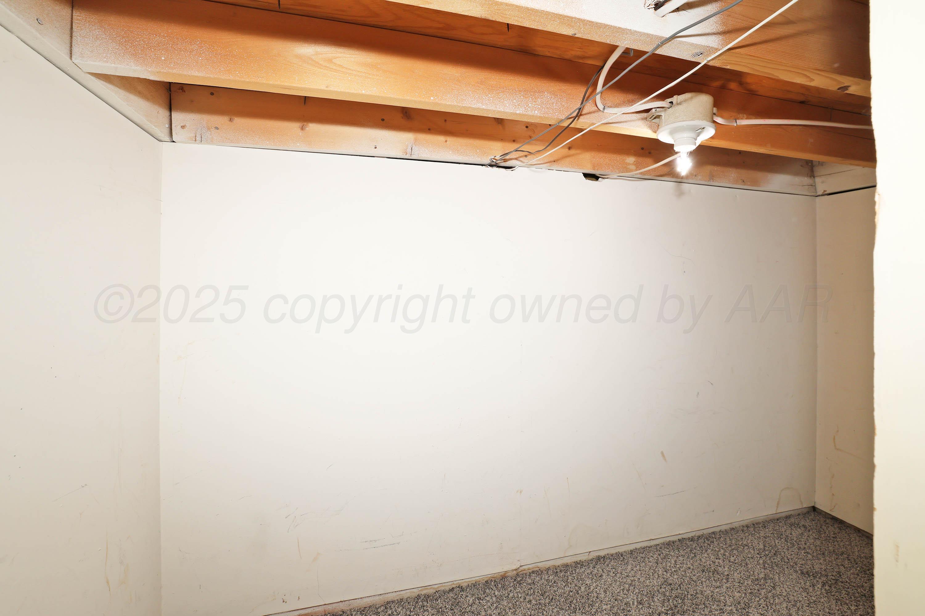 1615 South Bryan Street, Unit 19 Amarillo, TX 79102 - Photo 31 of 53 a view of a room with racks on the wall