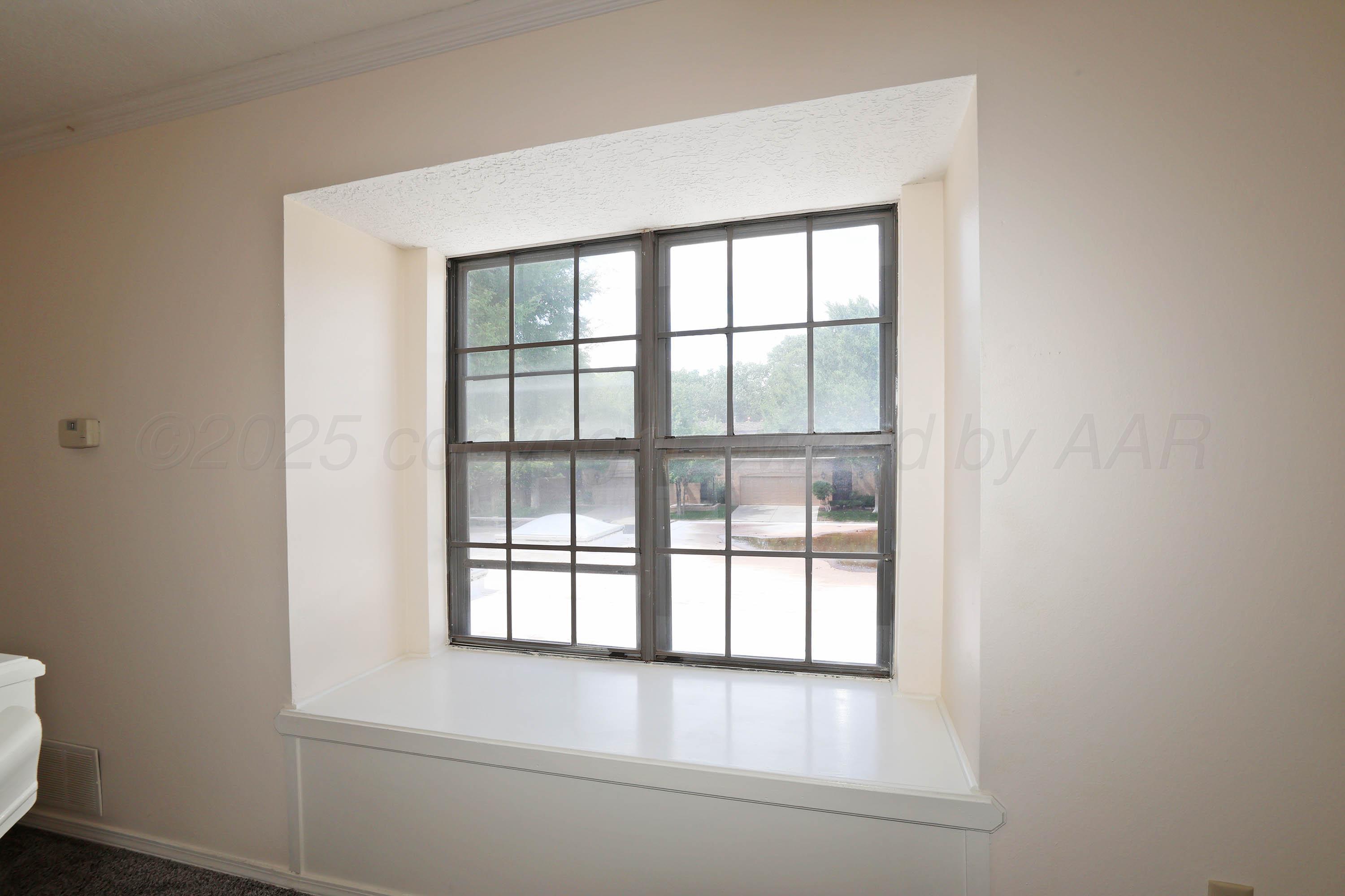 1615 South Bryan Street, Unit 19 Amarillo, TX 79102 - Photo 33 of 53 a view of an empty room with a window
