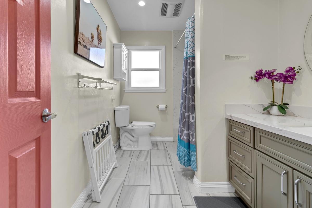 965 Portola Drive Del Rey Oaks, CA 93940 - Photo 16 of 23 a view of a bathroom with a sink and a mirror