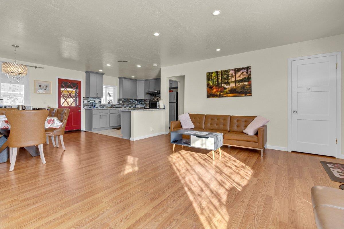 965 Portola Drive Del Rey Oaks, CA 93940 - Photo 6 of 23 a living room with furniture and a wooden floor