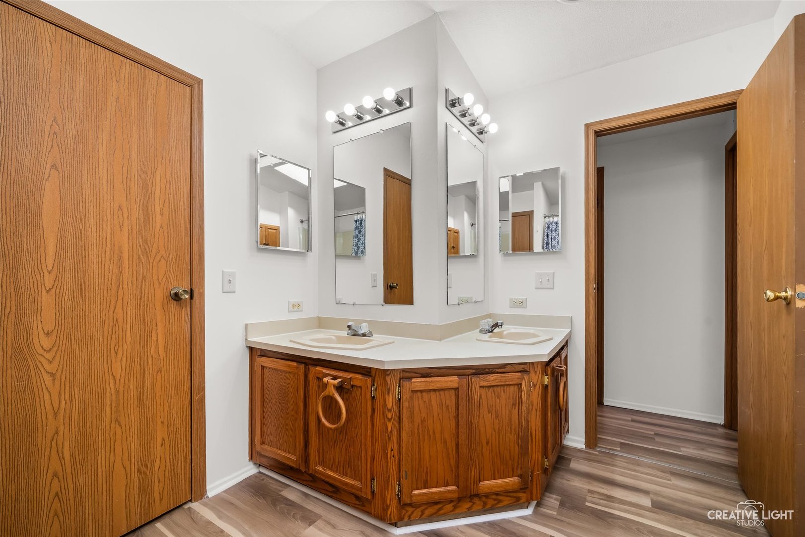 120 B Cardinal Lane Sandwich, IL 60548 - Photo 11 of 15 a bathroom with a sink double vanity and a mirror