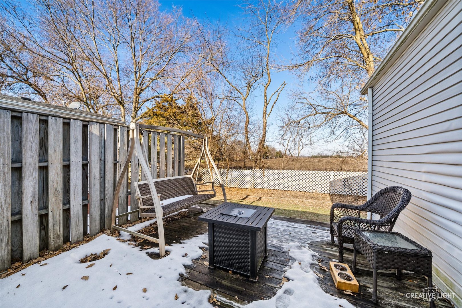 120 B Cardinal Lane Sandwich, IL 60548 - Photo 15 of 15 a view of a chairs and table in the patio with a fire pit
