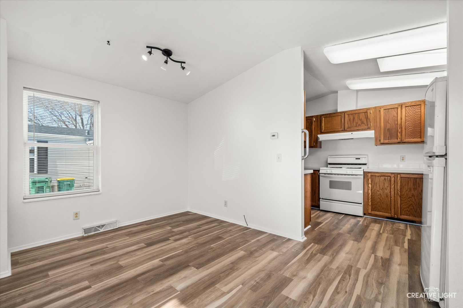 120 B Cardinal Lane Sandwich, IL 60548 - Photo 5 of 15 a room with a bed and a window