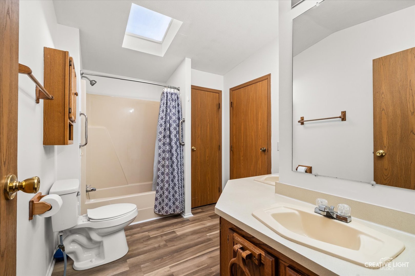 120 B Cardinal Lane Sandwich, IL 60548 - Photo 10 of 15 a bathroom with a sink toilet and shower