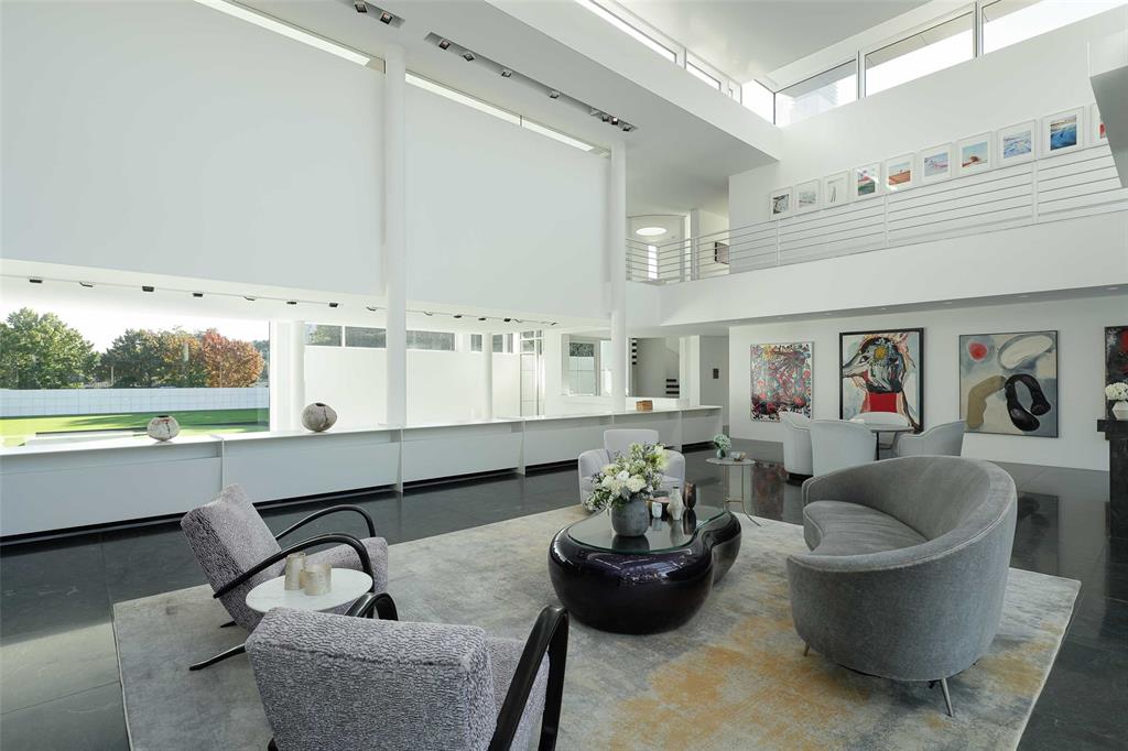8605 Preston Road Dallas, TX 75225 - Photo 13 of 40 a living room with furniture and a potted plant