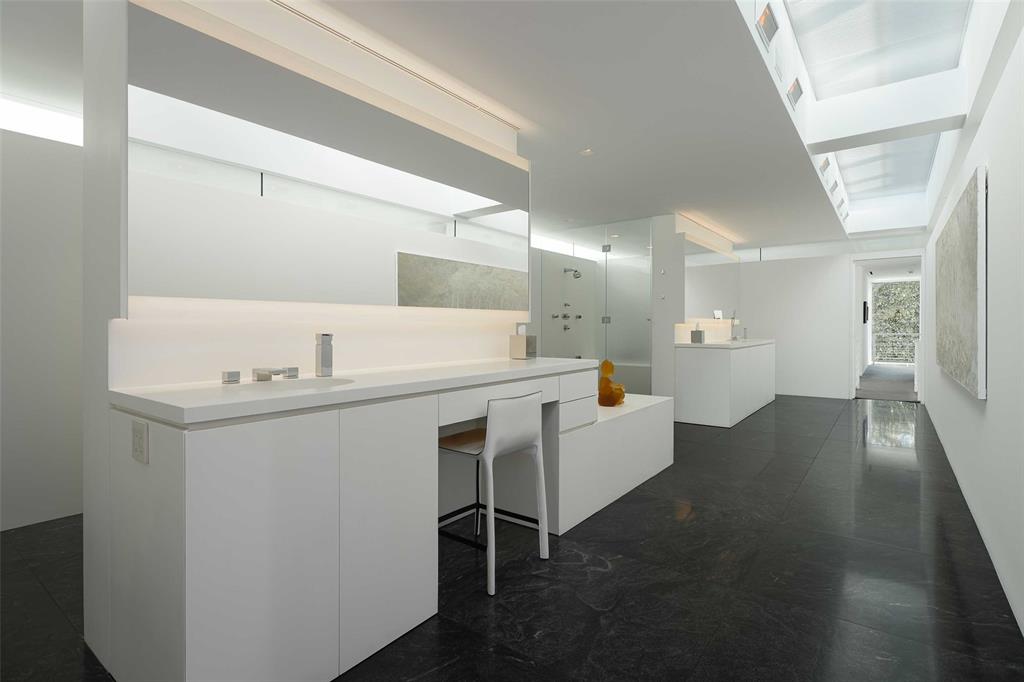 8605 Preston Road Dallas, TX 75225 - Photo 22 of 40 a utility room with washer and dryer