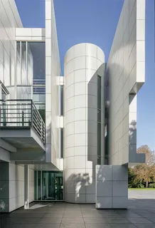 a view of a patio with couches and potted plants