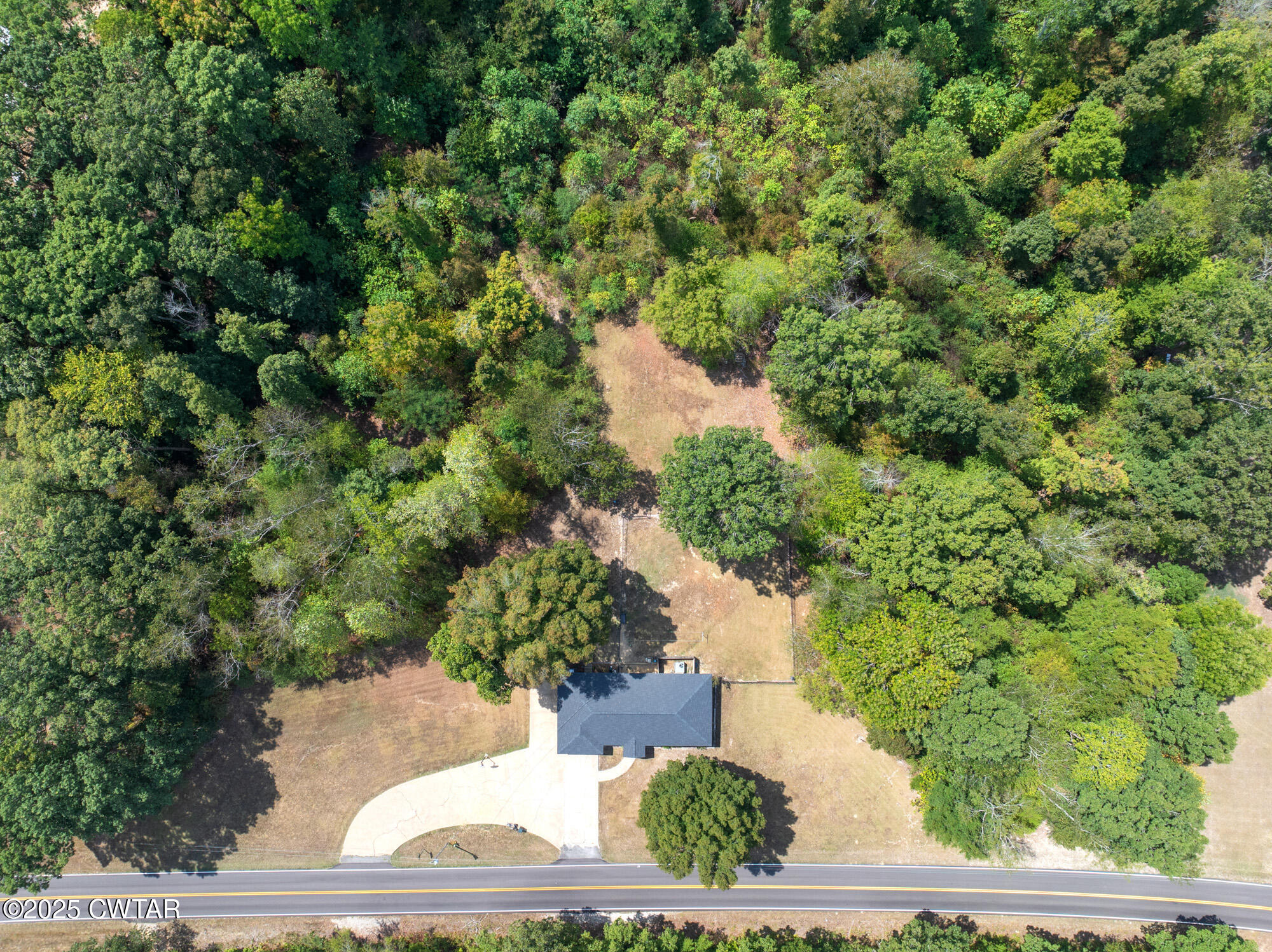 7028 3 Way Road Decaturville, TN 38329 - Photo 31 of 31 DJI_20250903134031_0470_D