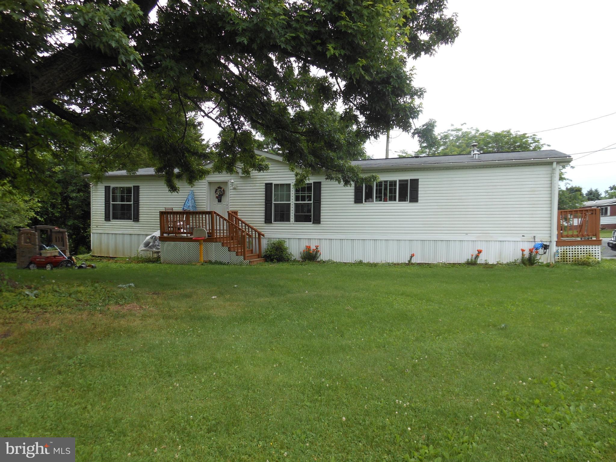 4550 Bull Road Dover, PA 17315 - Photo 1 of 14 a front view of house with yard and green space