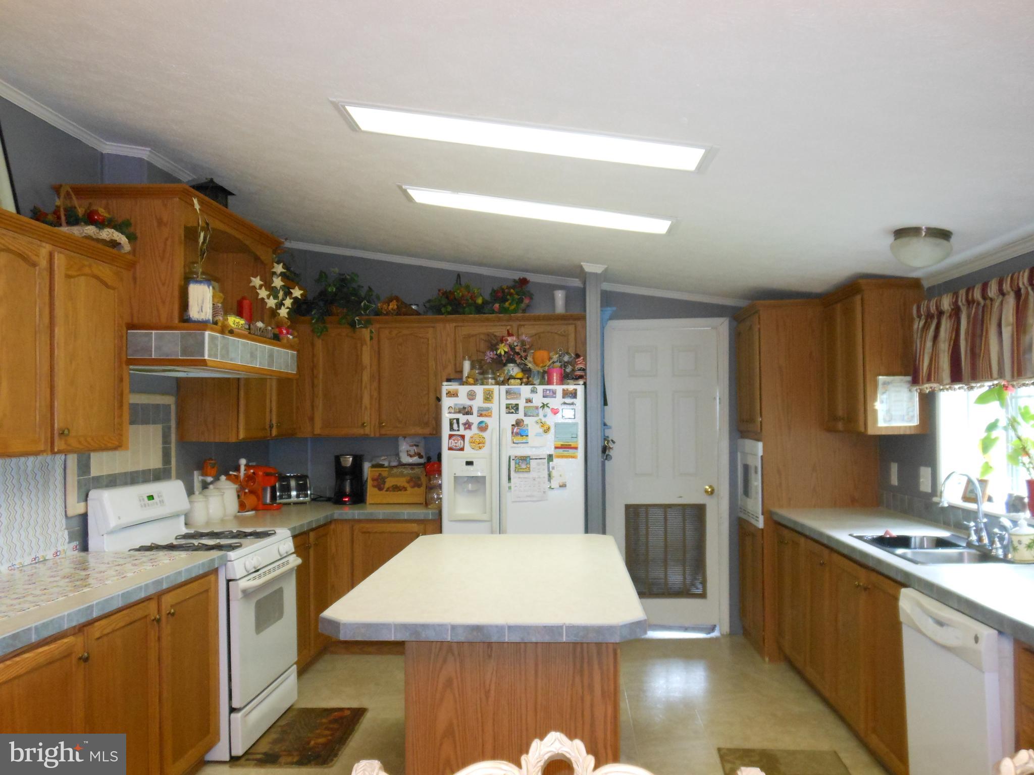 4550 Bull Road Dover, PA 17315 - Photo 2 of 14 a kitchen with a sink appliances and cabinets