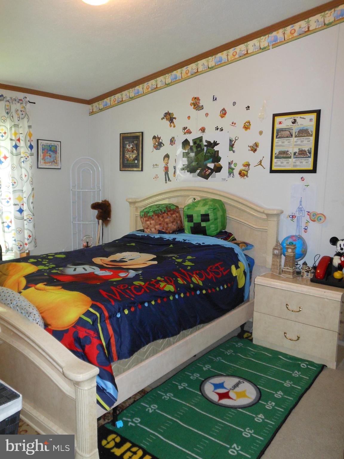 4550 Bull Road Dover, PA 17315 - Photo 12 of 14 a bedroom with a bed and a table in it