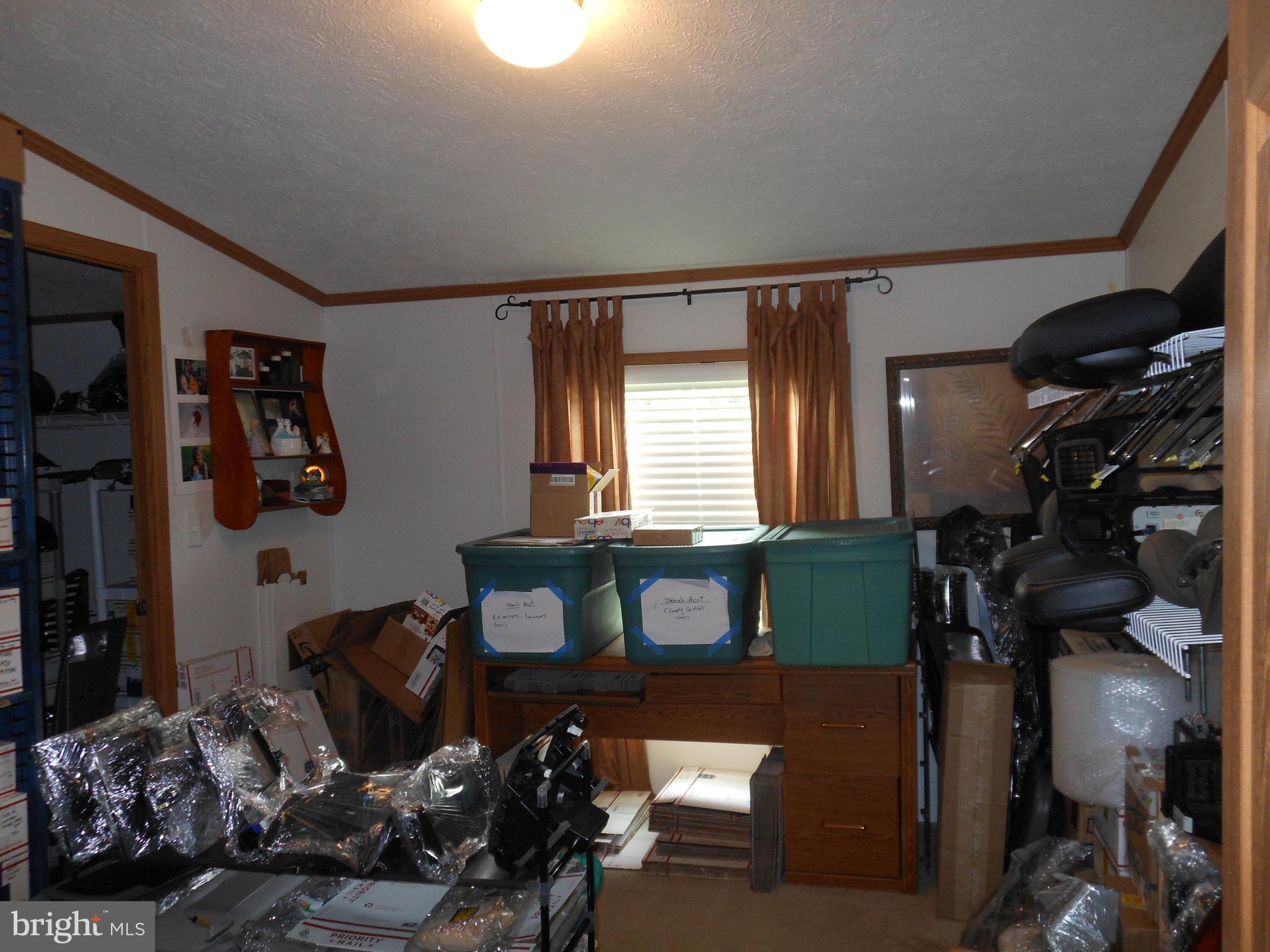 4550 Bull Road Dover, PA 17315 - Photo 13 of 14 a bedroom with furniture and a window