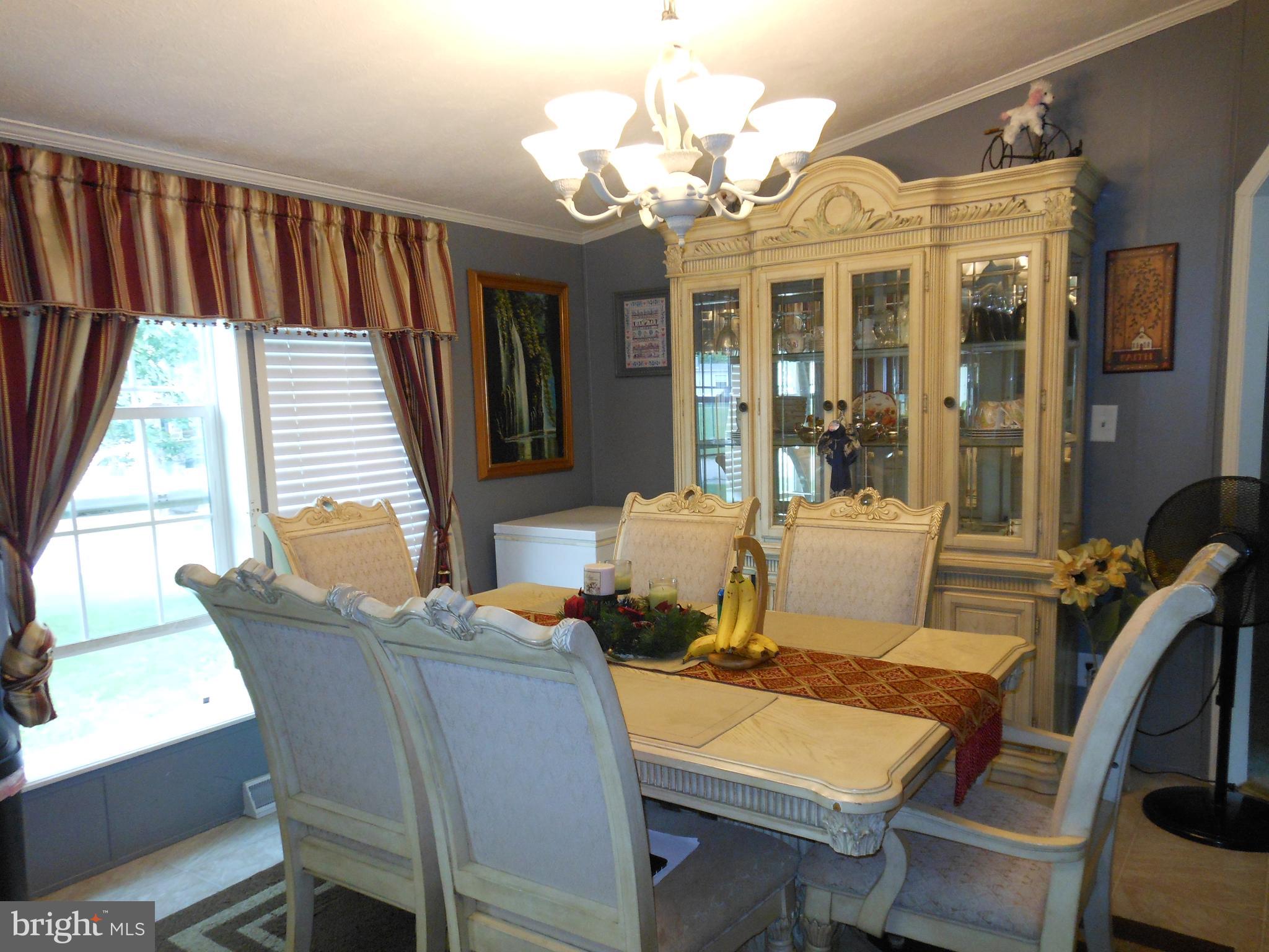 4550 Bull Road Dover, PA 17315 - Photo 3 of 14 a view of a dining room with furniture window and outside view