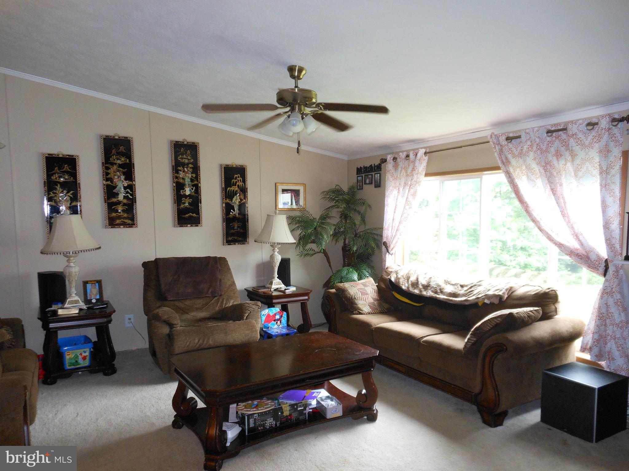 4550 Bull Road Dover, PA 17315 - Photo 5 of 14 a living room with furniture and a large window