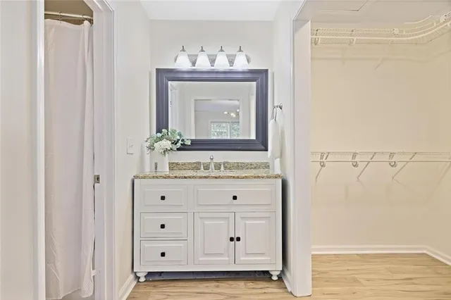 a view of a dresser with mirror