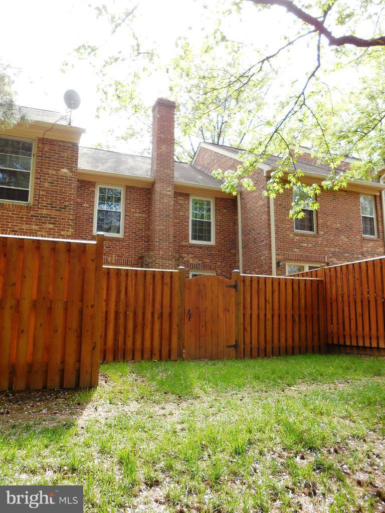 2540 South Walter Reed Drive, Unit 3 Arlington, VA 22206 - Photo 3 of 7 Fenced Rear Patio
