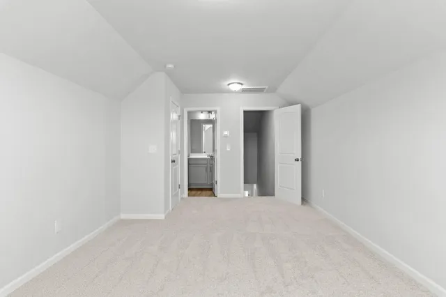 a bathroom with a sink toilet vanity and bathtub