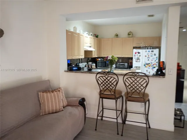 a view of a livingroom with furniture