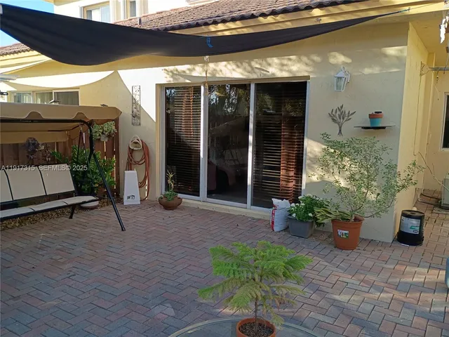a view of a porch with seating space