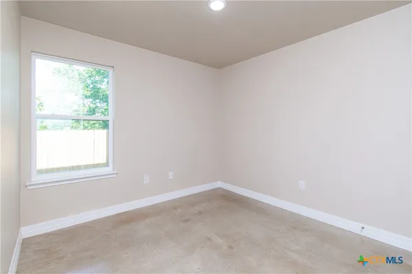 an empty room with a window