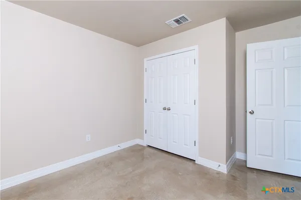 an empty room with closet
