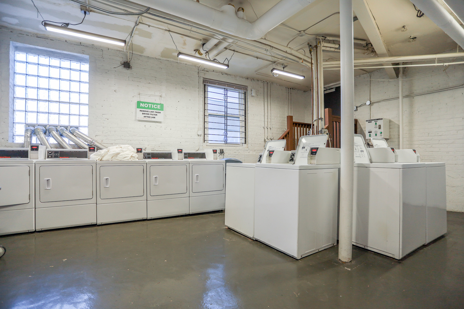 5742 South Stony Is Avenue, Unit 14 Chicago, IL 60637 - Photo 11 of 13 a kitchen with cabinets a sink and appliances
