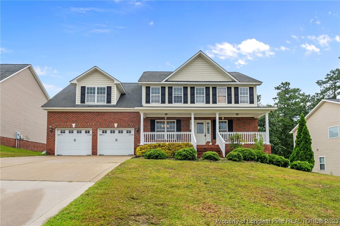 195 Culpepper Road Cameron, NC 28326 - Photo 1 of 46 a front view of a house with a yard