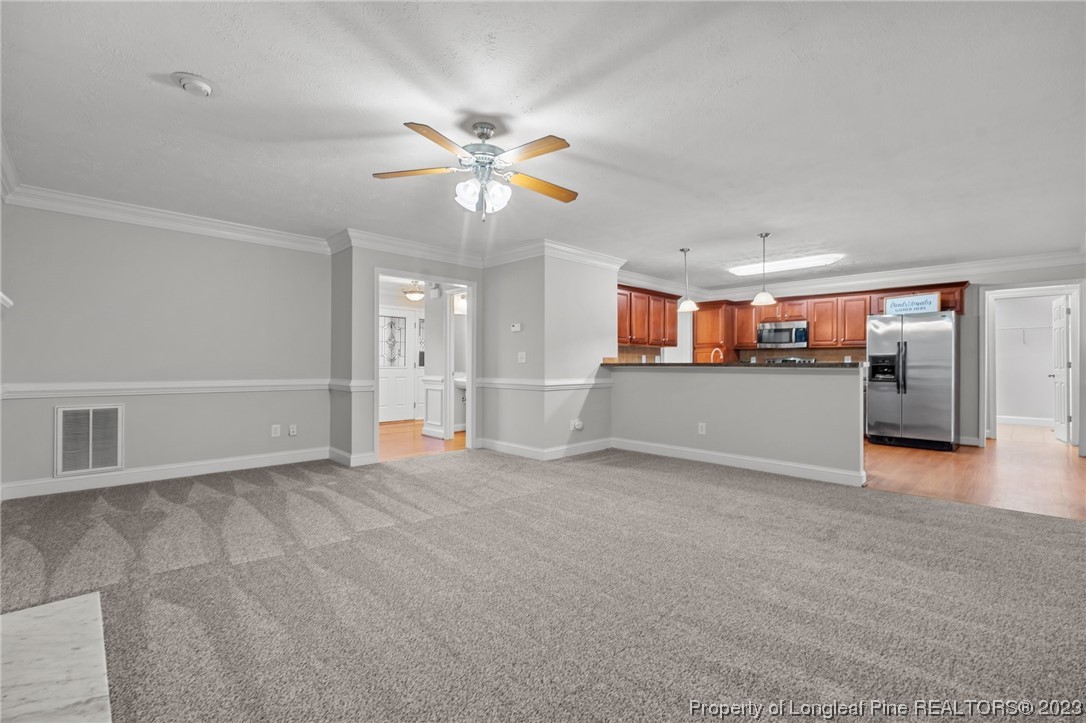 195 Culpepper Road Cameron, NC 28326 - Photo 11 of 46 a view of a kitchen with a sink and cabinet area