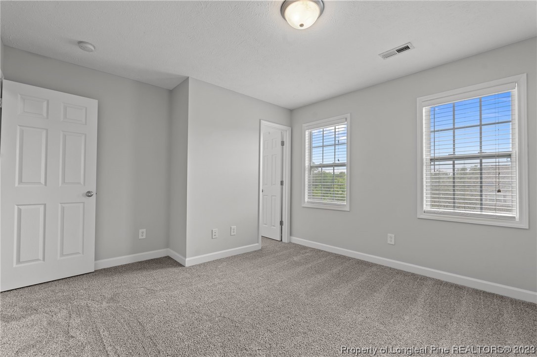 195 Culpepper Road Cameron, NC 28326 - Photo 31 of 46 a view of an empty room with a window