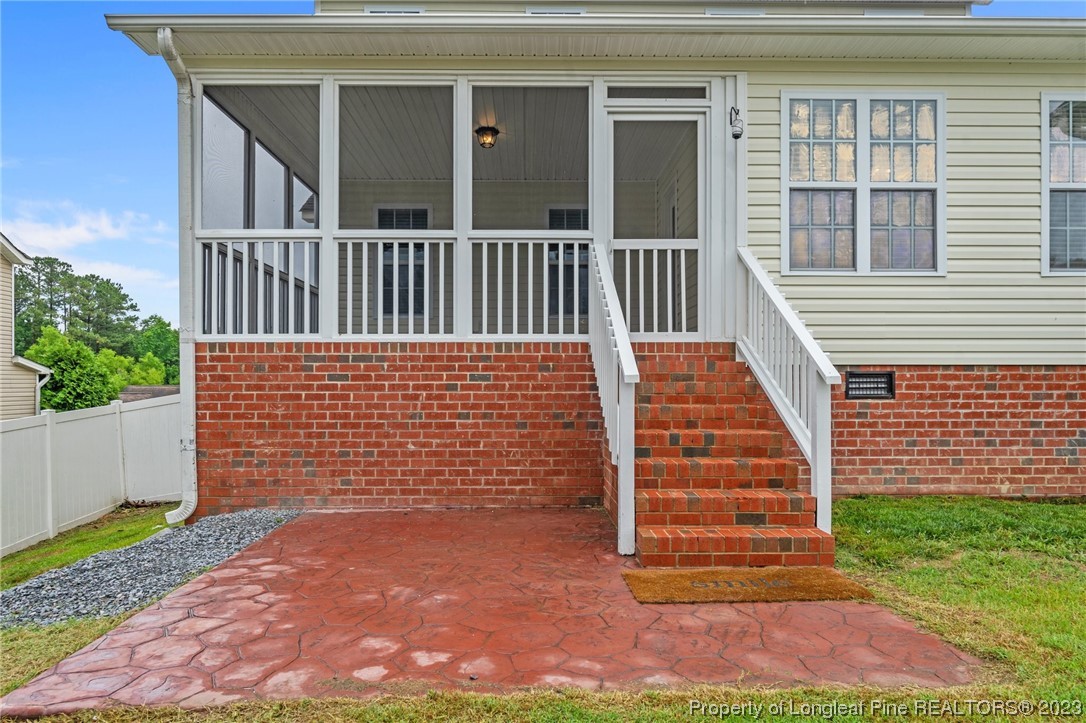 195 Culpepper Road Cameron, NC 28326 - Photo 39 of 46 a view of outdoor space with deck and yard